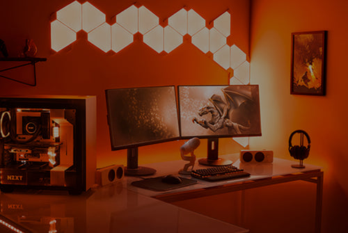 Two koorui monitor gaming and streaming setup with gaming PC, headphones, mic, and speakers.